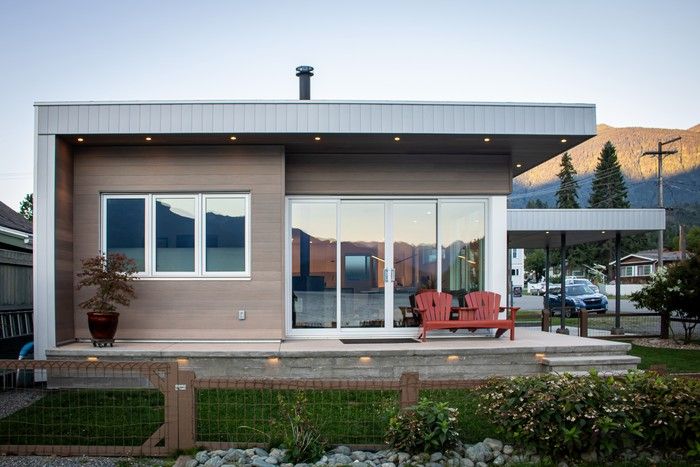 The home’s carport, once used as a covered patio, is now a covered parking area, designed to ease winter upkeep for its senior inhabitants.  The home’s carport, once used as a covered patio, is now a covered parking area, designed to ease winter upkeep for its senior inhabitants.