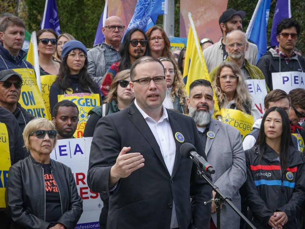 B.C. General Employees Union president and lead negotiator Paul Finch speaks at a rally in front of the Royal B.C. Museum in Victoria on Sept. 26, when the B.C. government made a shut-term return to the bargaining table. The BCGEU went back on strike on Sept. 29 and has continually escalated job action. B.C. General Employees Union president and lead negotiator Paul Finch speaks at a rally in front of the Royal B.C. Museum in Victoria on Sept. 26, when the B.C. government made a shut-term return to the bargaining table. The BCGEU went back on strike on Sept. 29 and has continually escalated job action.