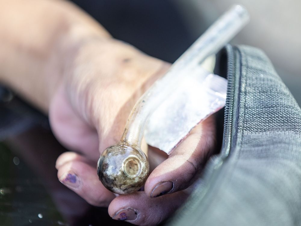 A person holds a meth pipe. Smoking drugs continued to be one of the leading methods of toxic consumption in overdose deaths in B.C. this summer. A person holds a meth pipe. Smoking drugs continued to be one of the leading methods of toxic consumption in overdose deaths in B.C. this summer.