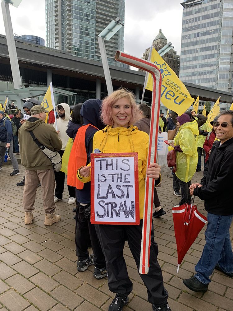 Willow Yamauchi with her homemade sign and prop at thew BCGEU march and rally. Willow Yamauchi with her homemade sign and prop at thew BCGEU march and rally.