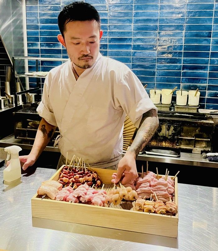 Chef Peter Ho with chicken pieces at Sumibiyaki Arashi. Chef Peter Ho with chicken pieces at Sumibiyaki Arashi.
