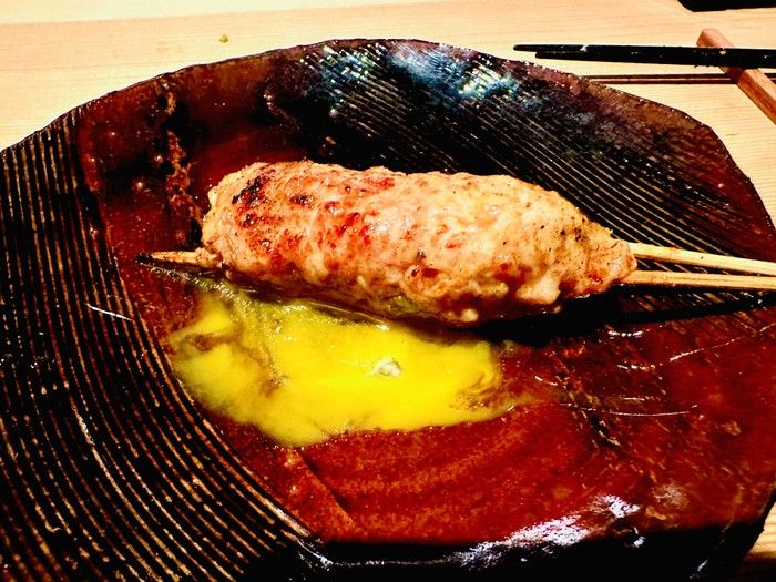 Chicken meatball skewer at Sumibiyaki Arashi. Chicken meatball skewer at Sumibiyaki Arashi.