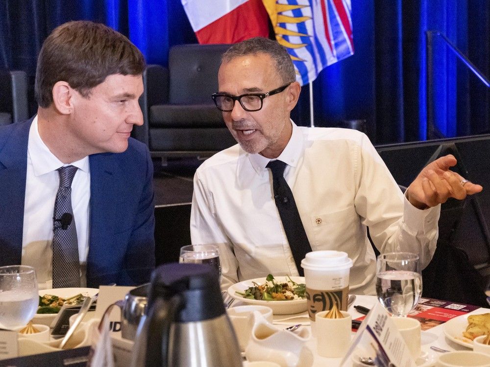 B.C. Premier David Eby and 'condo king' Bob Rennie at a sold out event hosted by UDI Urban Development Institute in Vancouver, BC, October 3, 2025. B.C. Premier David Eby and 'condo king' Bob Rennie at a sold out event hosted by UDI Urban Development Institute in Vancouver, BC, October 3, 2025.