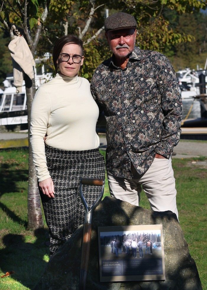  michael welsh and sarah chown at devonian harbour park, where cherry trees were planted 40 years ago in memory of four people who died of aids.