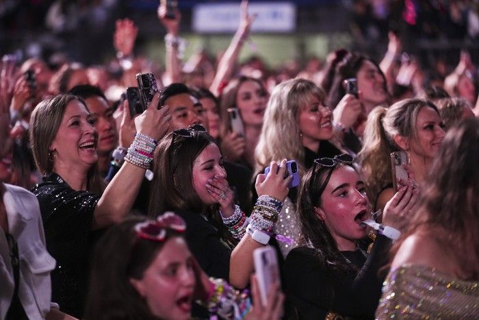 Concertgoers watch on during Taylor Swift’s The Eras Tour on Friday, Dec. 6, 2024, in Vancouver. Concertgoers watch on during Taylor Swift’s The Eras Tour on Friday, Dec. 6, 2024, in Vancouver.