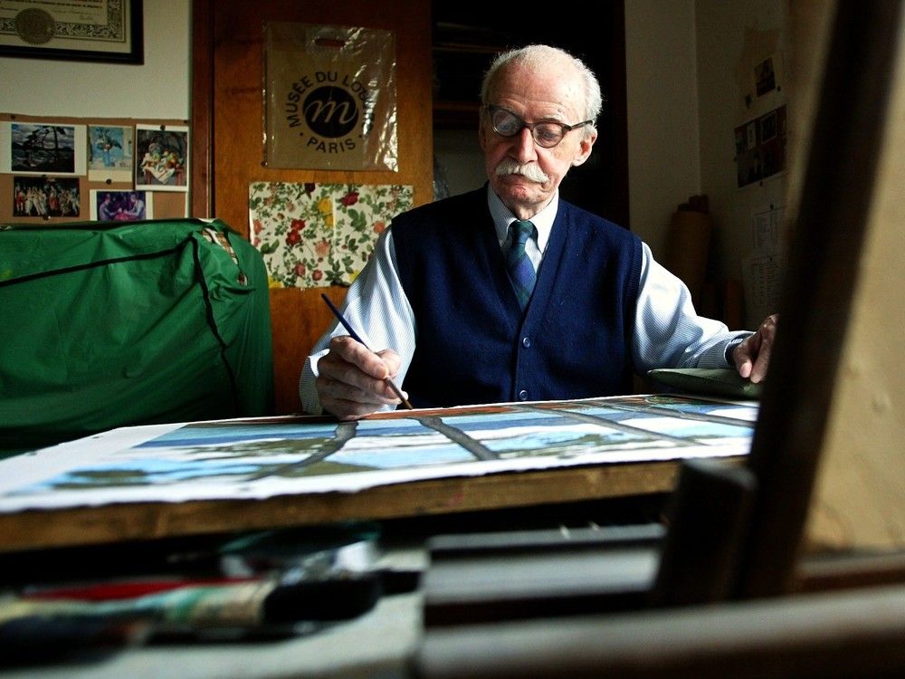 E.J. Hughes paints in his Duncan studio in 2004.