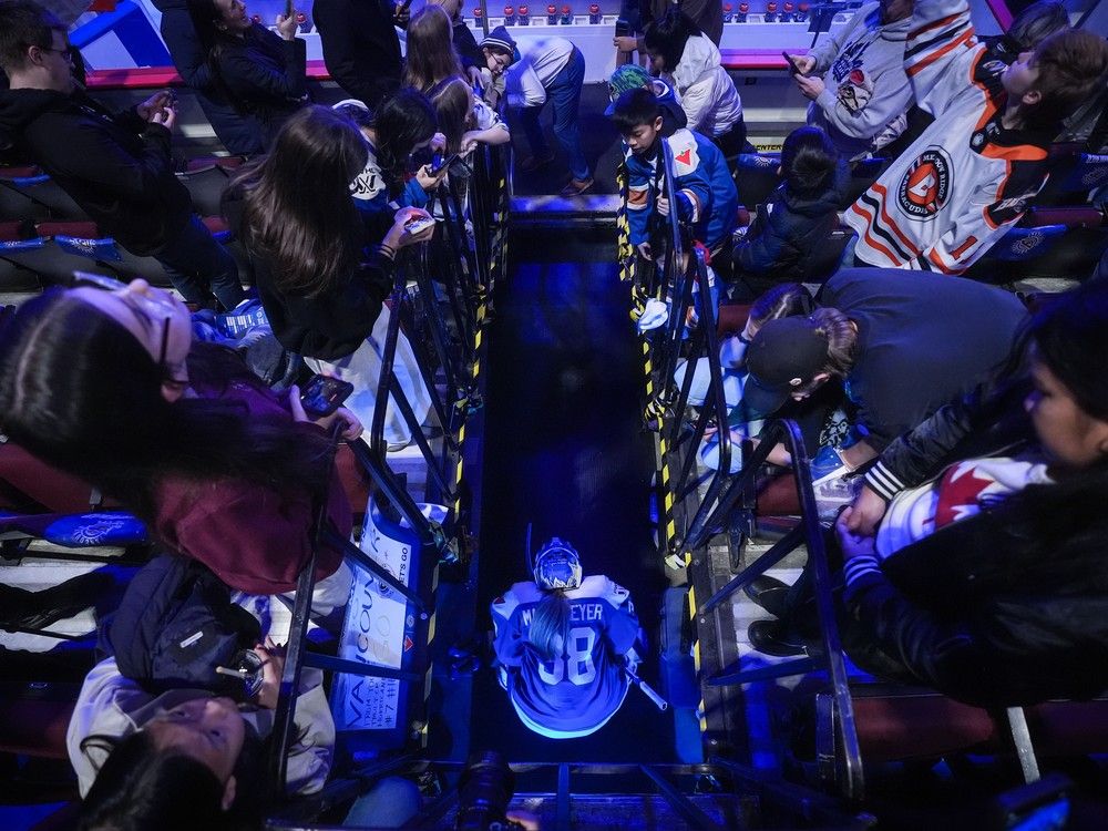 Vancouver Goldeneyes goalie Emerance Maschmeyer waits to go on the ice for warm-up before a PWHL hockey game against the Seattle Torrent, in Vancouver, on Friday, Nov. 21, 2025.