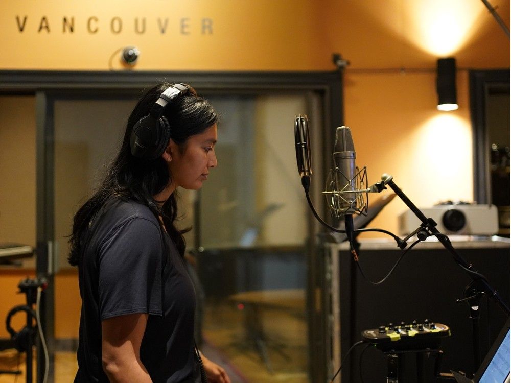  emiko wijeysundera recording her individual track at the sae institute vancouver.