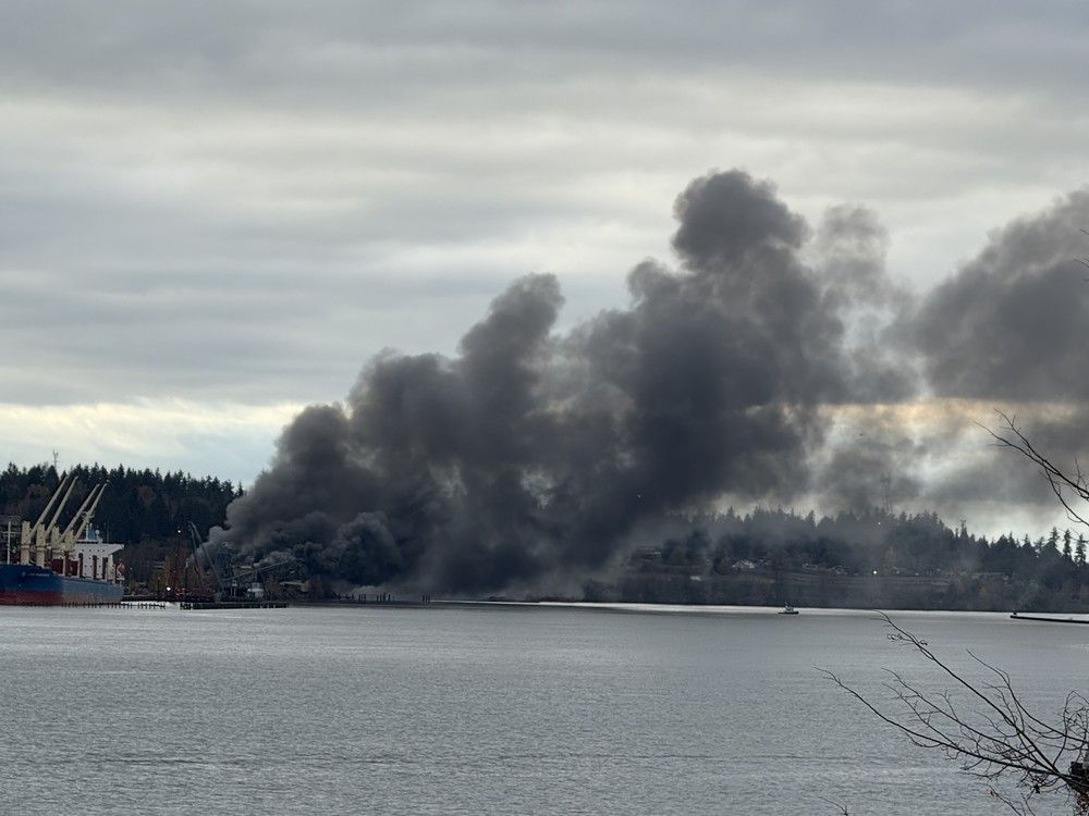 NEW WESTMINSTER, B.C.: Handout photo of a fire by the Fraser River, across from the New Westminster Quay.
Photo credit: Mary Beth Roberts