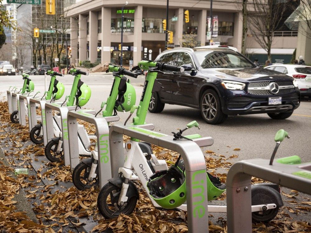  A Lime scooter docking station in a parking designated zone on Bute Street at Alberni Street in downtown Vancouver.
