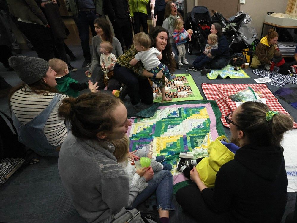 Supporters of Women Transforming Cities change diapers at Vancouver City Hall on Nov. 25 as the city’s budget draft could see the removal of public changing tables. Supporters of Women Transforming Cities change diapers at Vancouver City Hall on Nov. 25 as the city’s budget draft could see the removal of public changing tables.