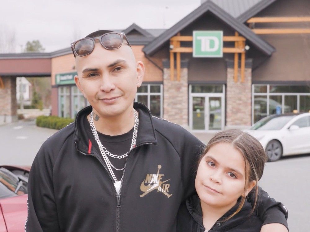 sharif bhamji outside the td bank branch in surrey where he says he was denied service.