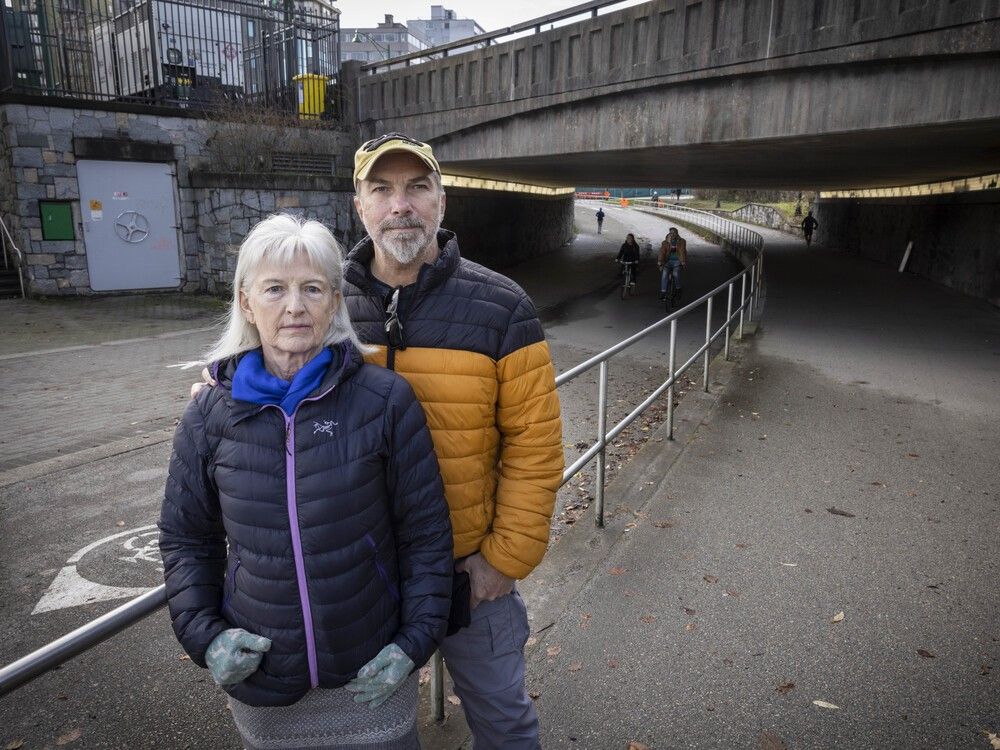 West End residents Mike Pearson and Lorna Seifried in Stanley Park near where a homeless man, who was viciously assaulted several weeks ago, often spent time.