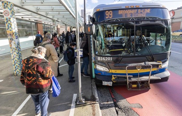  Passengers take the 99 bus route in Vancouver.