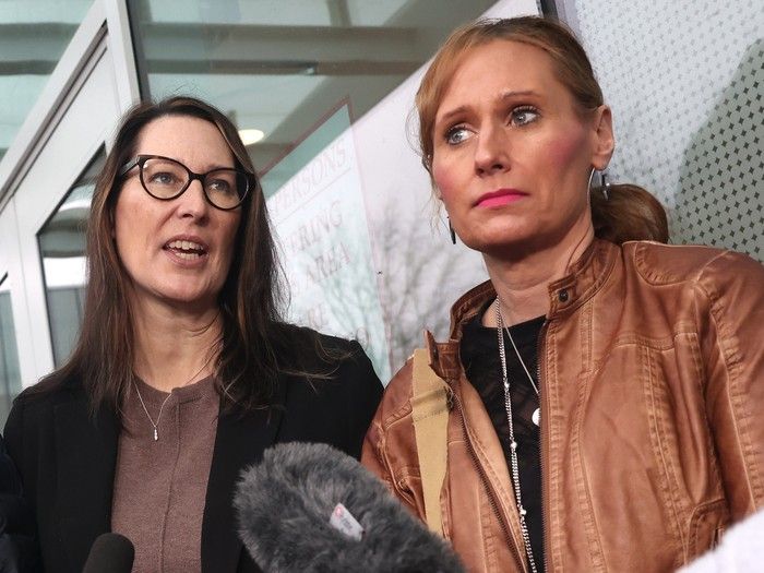  Sandra Barthel, left, and sister Kimberley Coleman speak to the media about the murder of their parents, Arnold and Joanne De Jong, outside B.C. Supreme Court in Abbotsford on Monday.