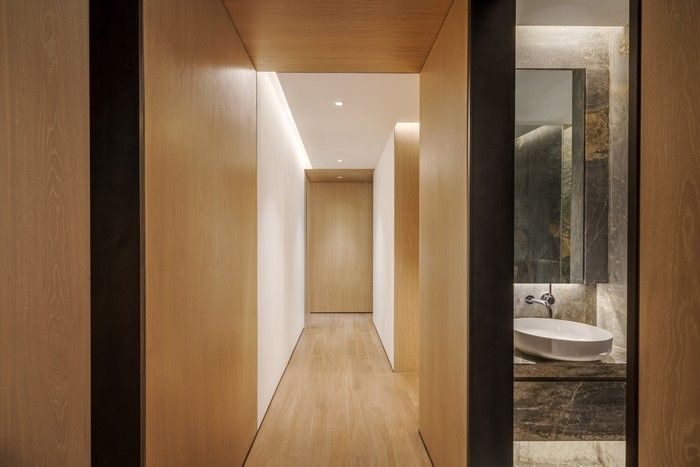  Recessed lighting and ceiling planes at Jing’an Residences indicate where to walk, pause, and transition, creating a calm sequence.