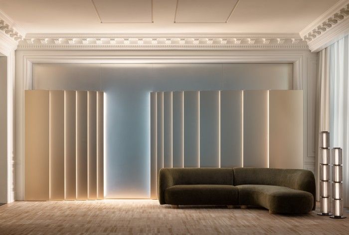  This pre-function area at The St. Regis Toronto, designed by Mason Studio and completed in 2025, features contrasting warm and cool light to draw the eye and indicate a point of gathering and pause for guests.