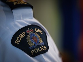 An RCMP patch is seen on the shoulder of a Surrey RCMP Officer