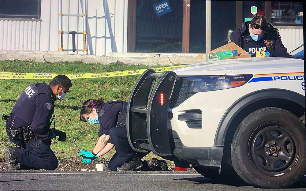  Surrey RCMP officers at the scene of an extortion-related shooting in the 19300-block of Langley Bypass in east Cloverdale on Monday, Jan. 19, 2026.