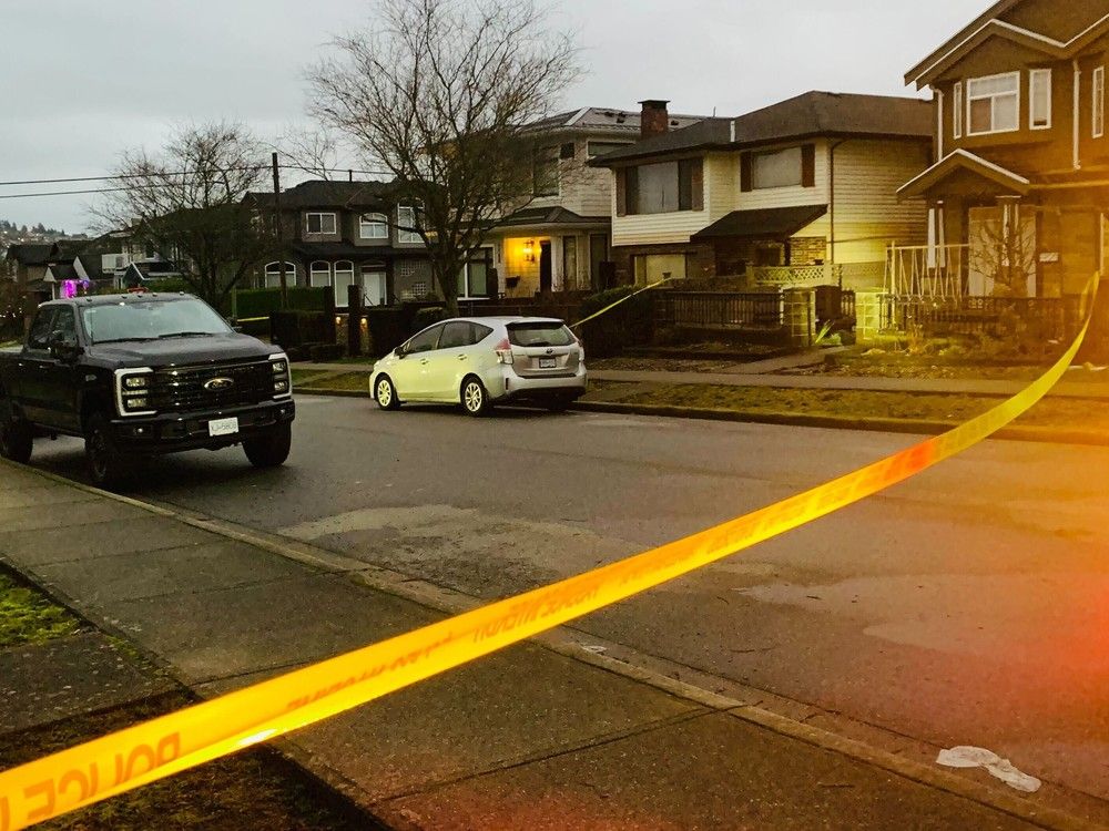  Officers on scene of a shooting on Oxford Street in Burnaby Tuesday night.