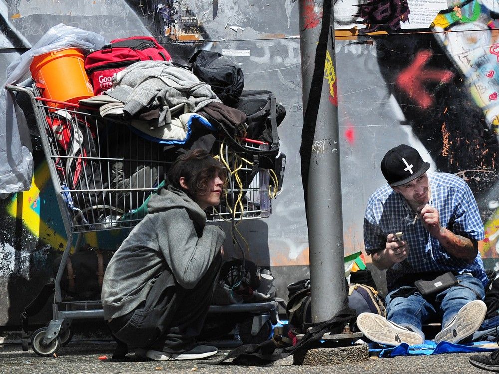 Open drug use on the street in Vancouver, B.C. on May 25, 2023.