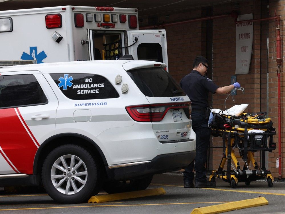  A paramedic is pictured outside Lions Gate Hospital on Feb. 21, 2024.