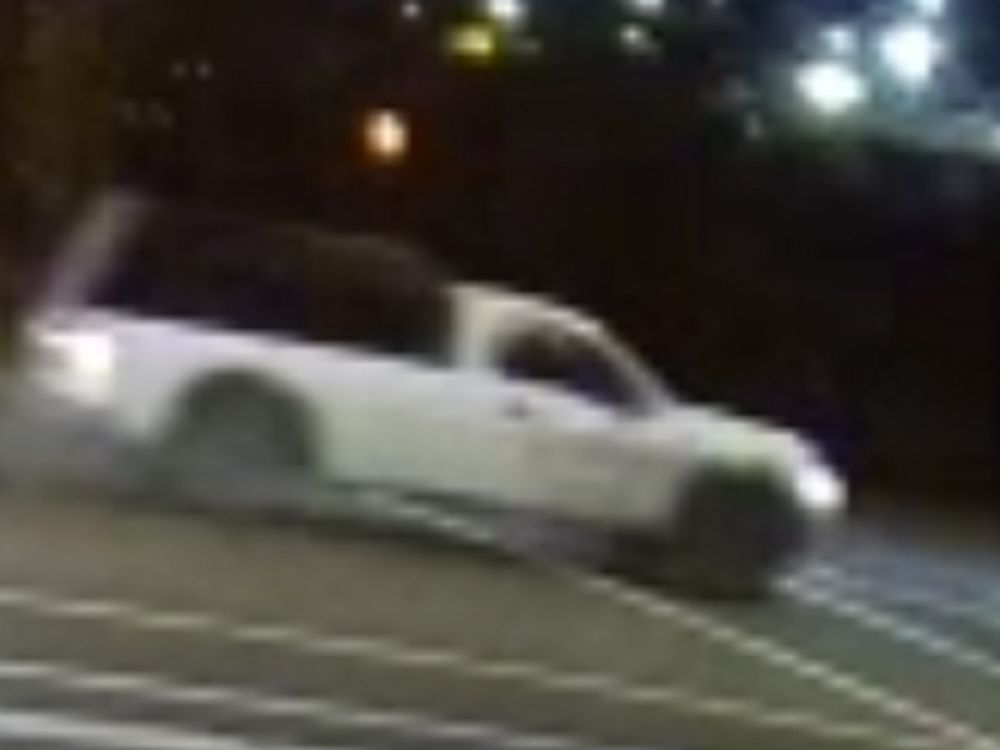  A white, two-door pickup with a black canopy and its driver are being sought by police after a hit and run last Friday.