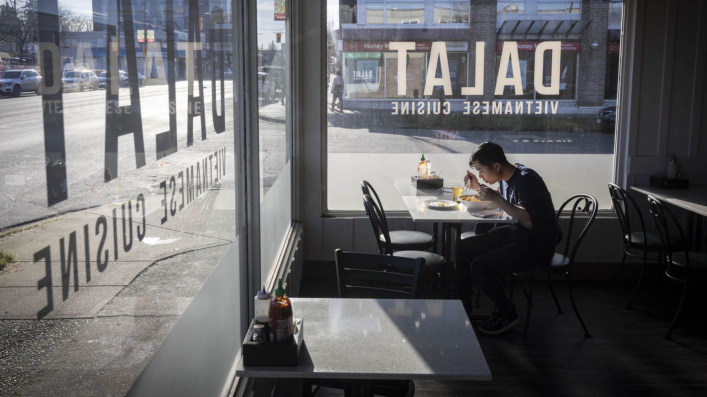 Joseph Mai has lunch at Dalat Vietnamese Cuisine restaurant on Victoria Drive in Vancouver. Numerous restaurants call Victoria Drive home, making the street a good choice for those looking for a diversity of culinary choices.