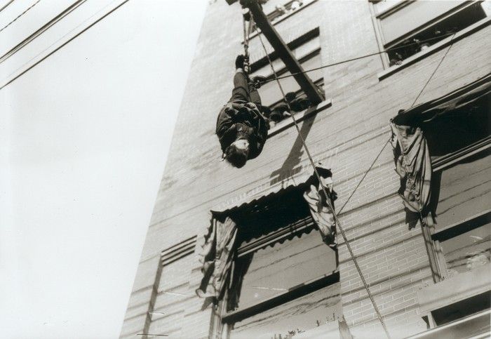 Harry Houdini performing an escape at the Vancouver Sun building on March 1, 1923.  W.J. Moore Vancouver Public Library 70208 