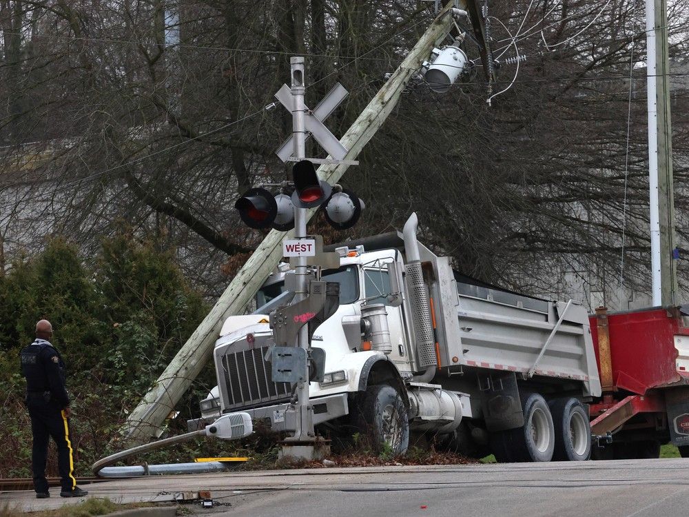 Burnaby RCMP and firefighters were on the scene at 2550 Boundary Road after a semi trailer hit a hydro pole on Jan. 13.