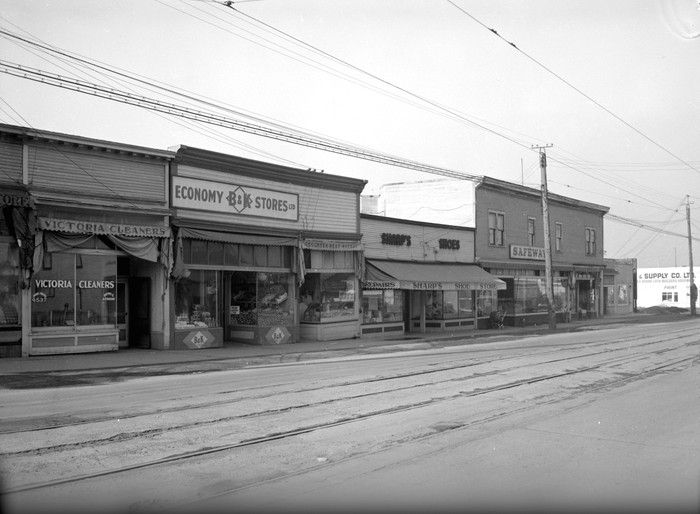 1948: Businesses on Victoria Drive, including Victoria Cleaners, Economy B&K Stores, Sharp's Shoe Store, and Safeway.