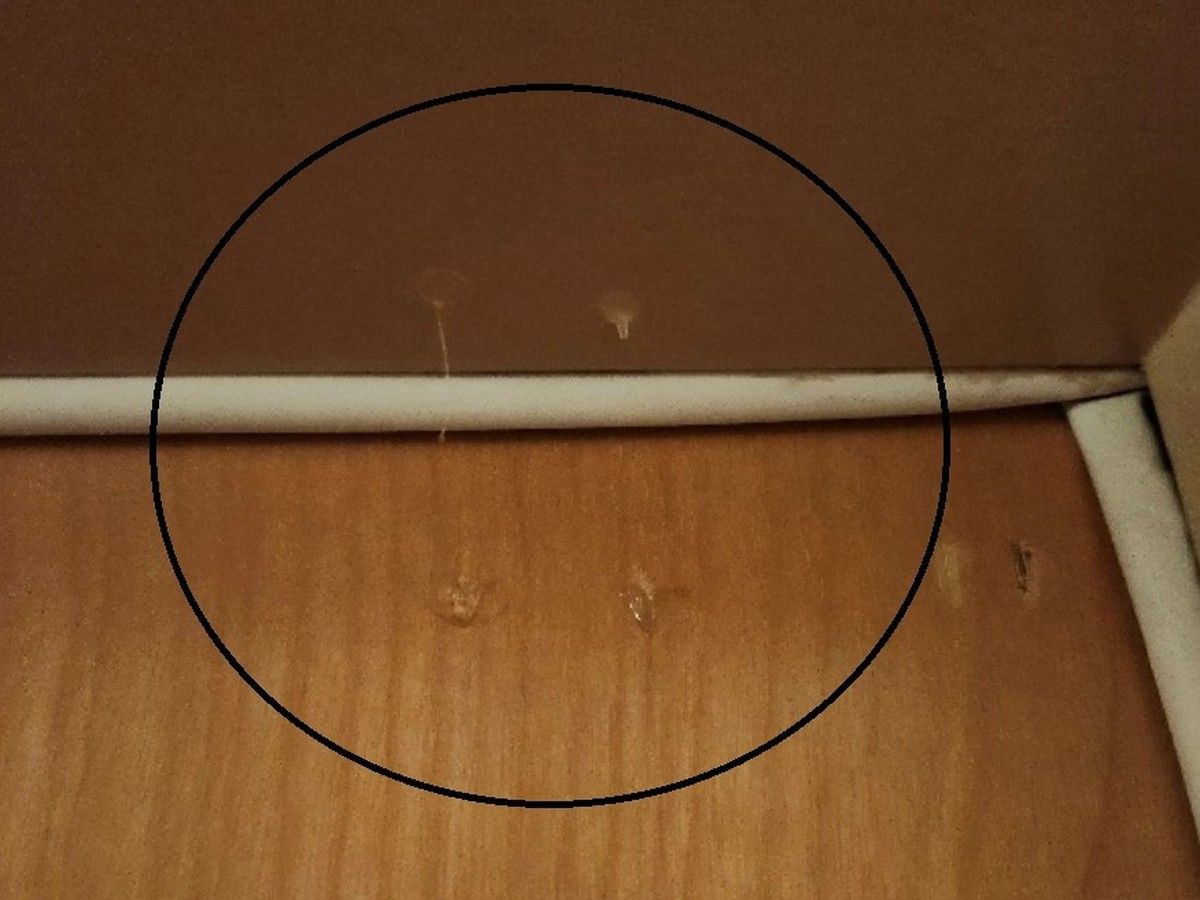 This handout image from the VPD shows how suspects used hot glue between the door frame and the door to see which doors had been opened, thus breaking the dried string of glue.