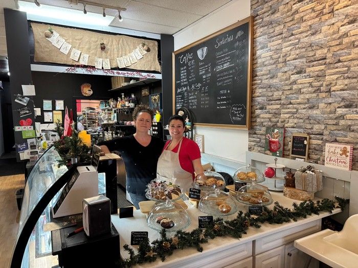 Cozy Bean owner (at right) Antonella Green in her café in Langley