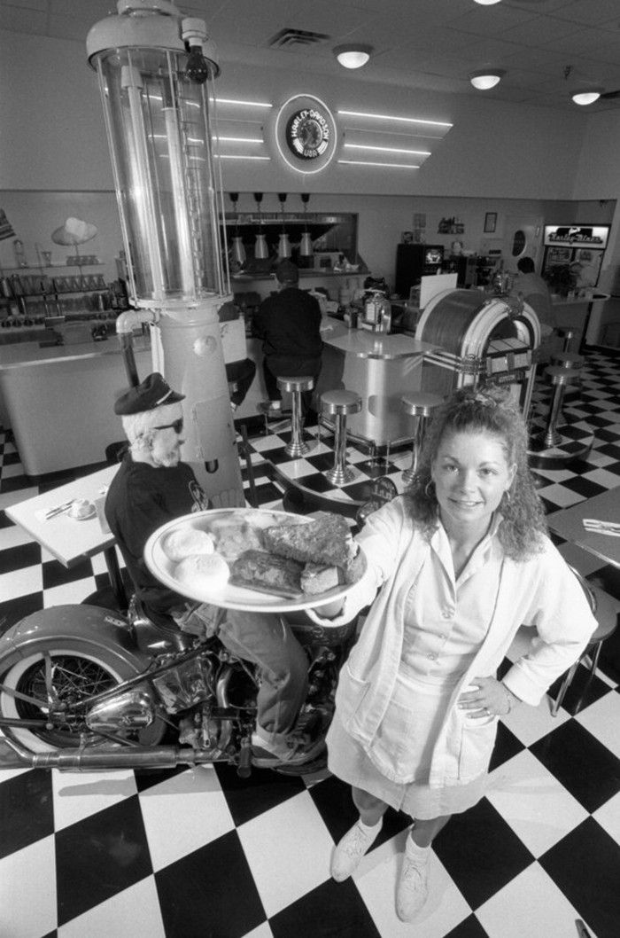1996: A server holds up a plate of food at Jim's Harley Diner at 11951 95A Ave. in Delta.