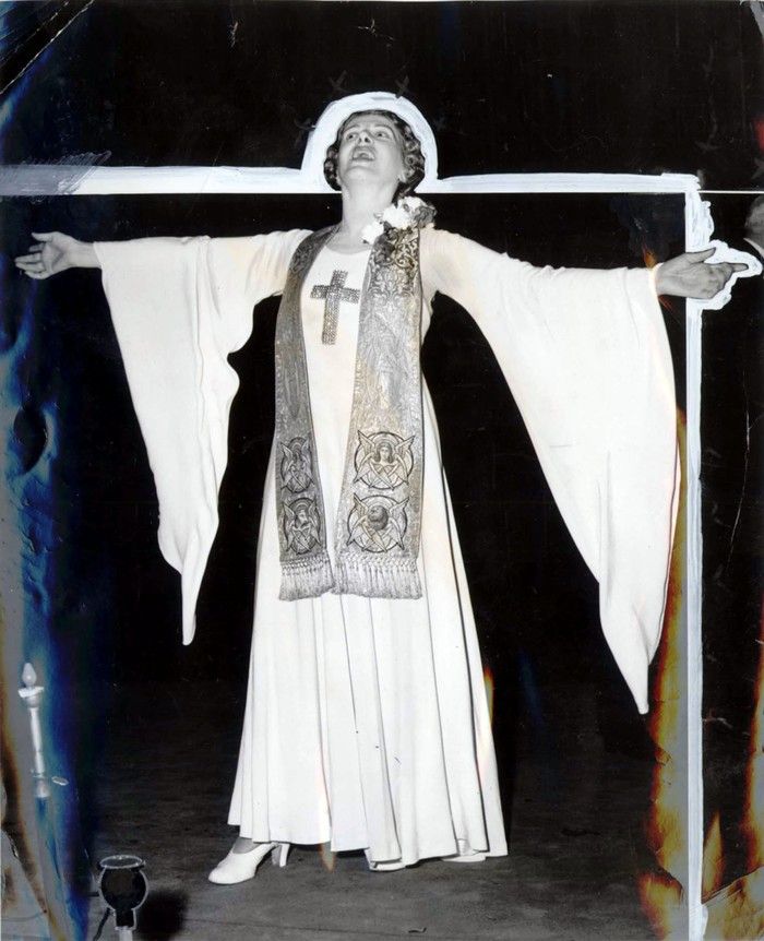  Evangelist Aimee Semple McPherson in action. Photo is marked up for cropping before being used in print.