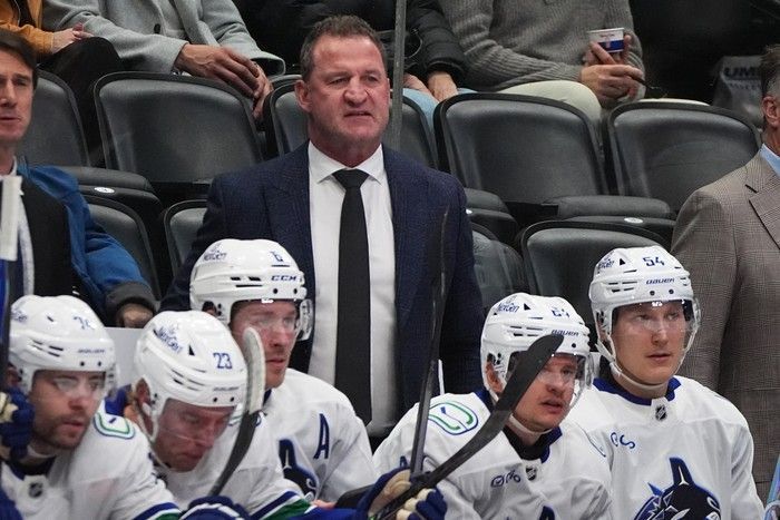 Vancouver Canucks head coach Adam Foote looks on from the team bench in a Dec. 2, 2025, game in Denver.