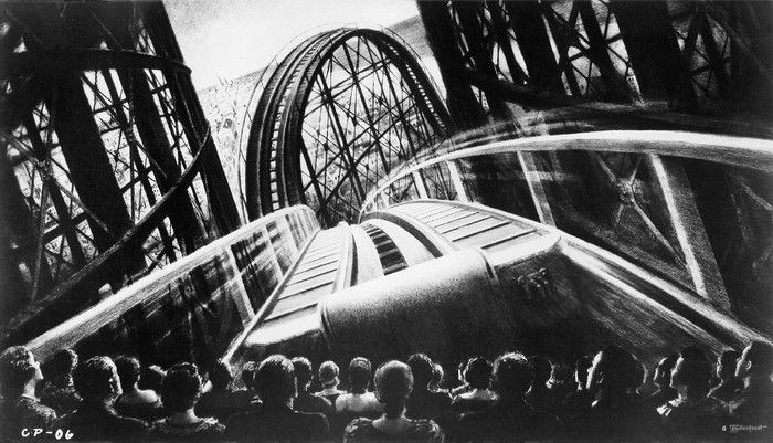 Illustration from a Cinerama ad showing an audience immersed in a giant screen showing a roller coaster ride.  Courtesy of  the American Widescreen Museum and Brett Hart of Hart and Soul Entertainment 