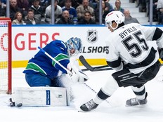 Vancouver Canucks goaltender Kevin Lankinen (32) stops Los Angeles Kings' Quinton Byfield (55) during the second period at Rogers Arena on Thursday night. The Kings won 4-0.