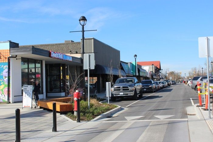 Parked cars line the one-way stretch of the Fraser Highway in Langley City.