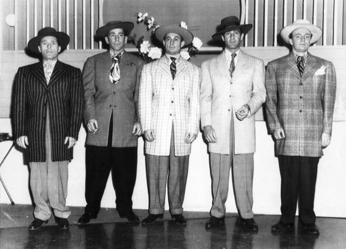 Five actors dressed as zoot-suiters line up in a row in this 1943 file photo.  