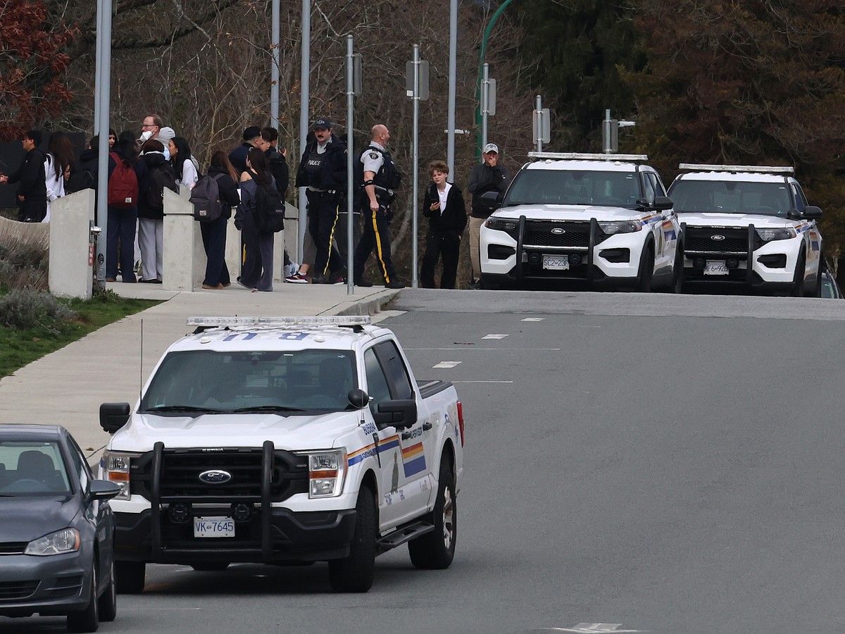 Students leave Burnaby North High School following a 40 minute lockdown, after RCMP found the threat was bogus.