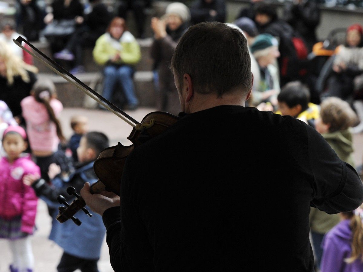  Musical duo Fiddlestix plays for crowd that gathered for CelticFest Vancouver Pacific Centre plaza in 2011. The festival was scaled back in 2025 due to lack of funds.