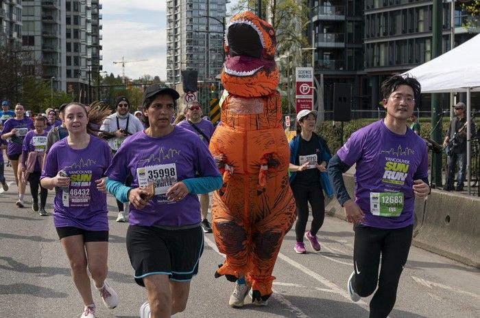 T-Rex runs the course at the 2026 Vancouver Sun Run in Vancouver on April, 19, 2026.