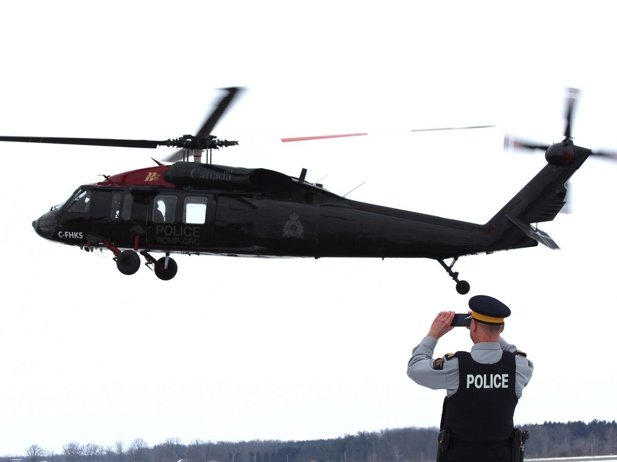 A Black Hawk helicopter taking off at the London International Airport on Feb. 11, 2025 during a demonstration.
