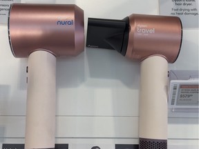 A side-by-side comparison of the Dyson Supersonic Nural and Dyson Supersonic Travel hair dryers.