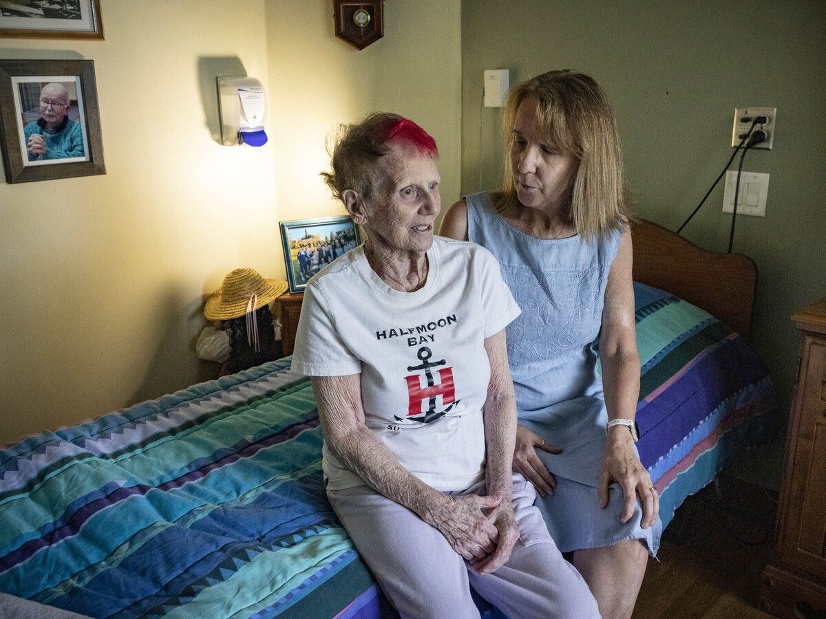 Teri MacKay with her mother Margaret Hauser at the long-term care home where Margaret is staying in Surrey.