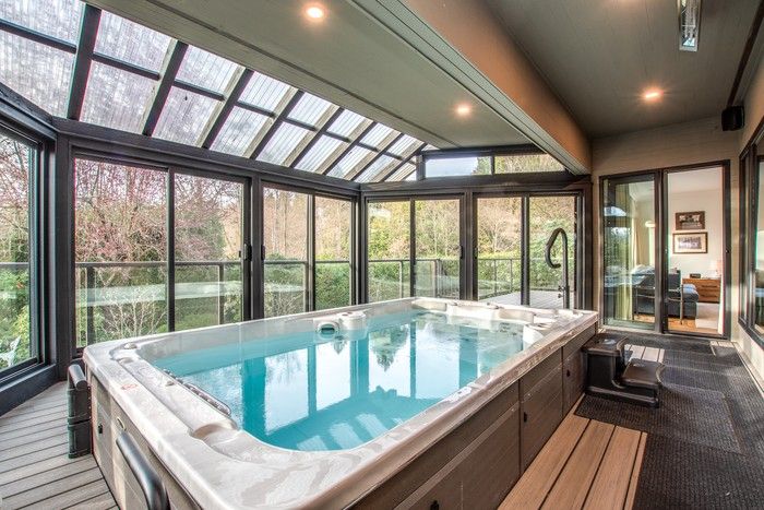  Home features a Hydropool AquaSport self-cleaning, energy-efficient jetted swim spa.