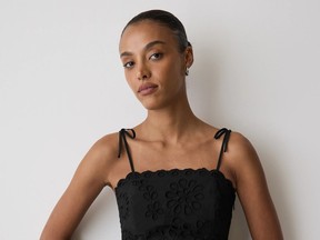 Model wears an embroidered peplum blouse, $89.90 at RW & Co., rw-co.com.