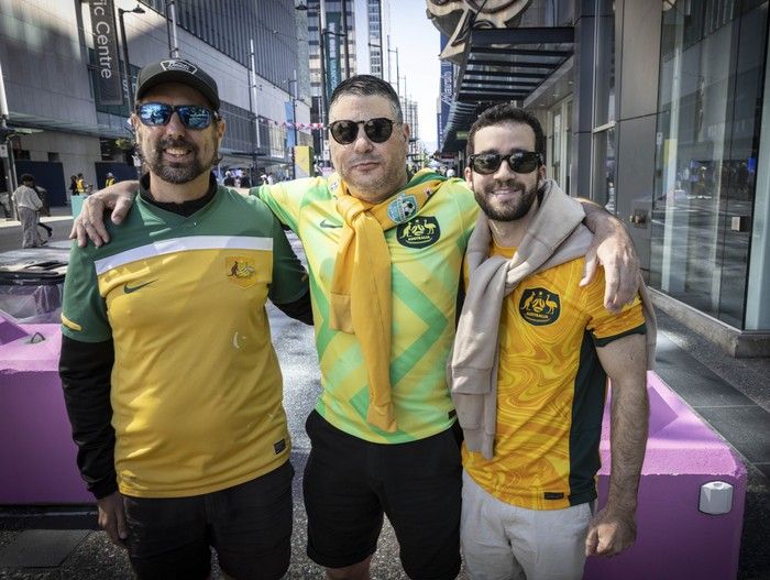 Australian visitors (from left) Ben Moring, Andrew Marler and Callum Daly take in the FIFA Pedestrian Zone on Granville Street in downtown Vancouver Thursday, June 11, 2026. The trio are in Vancouver for the FIFA World Cup 2026.