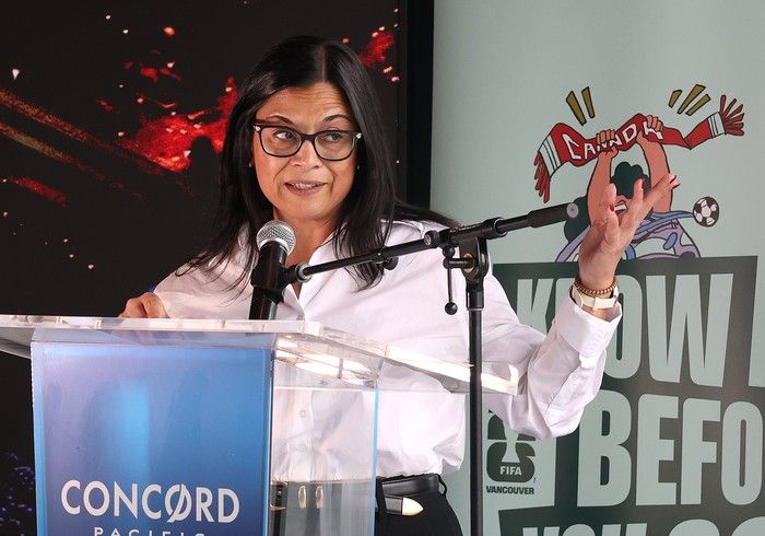 Jessie Adcock, Vancouver Host Committee lead, explains the spectator route at a press conference in Vancouver on June 8, 2026.